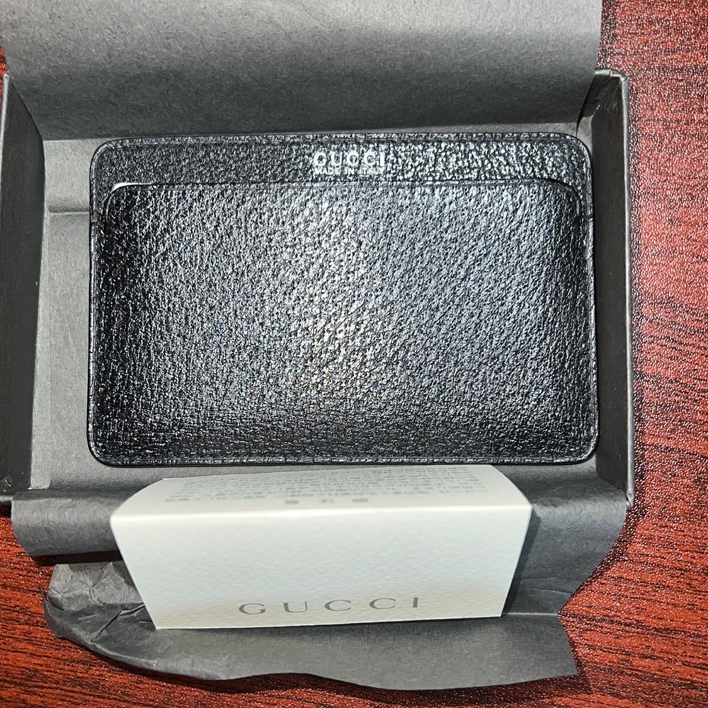 Brand new, never used Gucci leather card case.